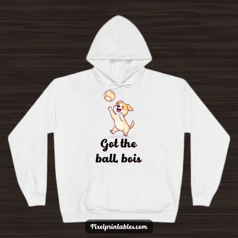 Funny hoodie featuring a happy pixelated dog catching a pixelated ball mid-air, offering cozy warmth and retro gaming nostalgia.