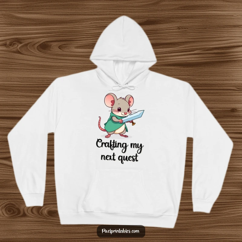 Funny hoodie with a curious mouse crafting a pixel sword, perfect for cozy gaming sessions.